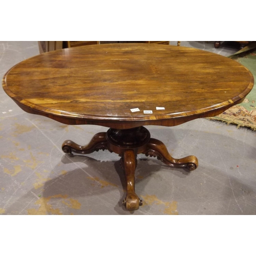 2076 - Victorian rosewood oval breakfast table with four carved supports and central column, 147 x 108 x 72... 