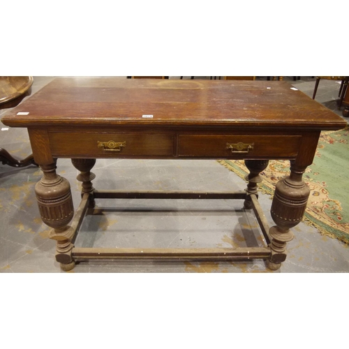 2078 - A Victorian two drawer buffet table, with carved bulbous supports. 127 x 66 x 82cm H.