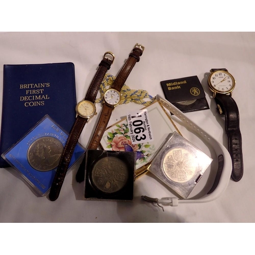 1063 - Mixed UK coins, four wristwatches and a small notebook and pen. UK P&P Group 1 (£16+VAT for the firs... 