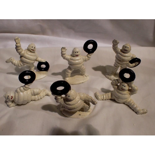 1070 - Cast iron six small Michelin men, H: 80 mm. UK P&P Group 1 (£16+VAT for the first lot and £2+VAT for... 