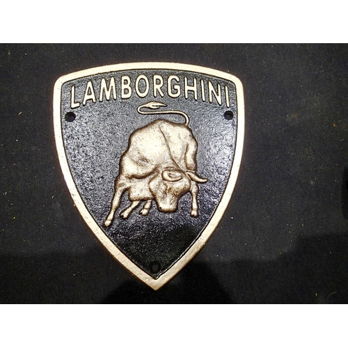 1377 - Cast iron Lamborghini plaque. W:17cm. UK P&P Group 1 (£16+VAT for the first lot and £2+VAT for subse... 