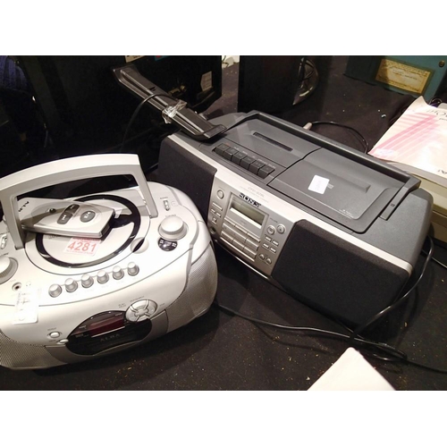 1415 - Sony CD cassette player and an Alba example. All electrical items in this lot have been PAT tested f... 