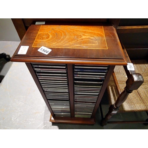 1566 - Mahogany twin CD rack and a quantity of CDs. Not available for in-house P&P