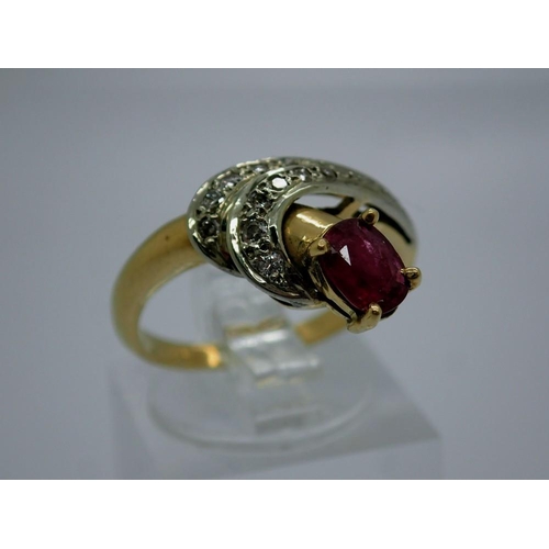 40 - Contemporary 18ct gold ruby and diamond set crossover ring, size N/O, 4.1g. UK P&P Group 0 (£6+VAT f... 