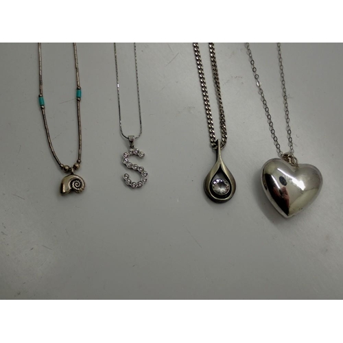 75 - Four 925 silver pendant necklaces, largest chain L: 66 cm. UK P&P Group 0 (£6+VAT for the first lot ... 