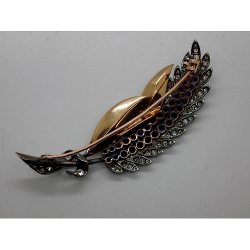 76 - Late 19th/early 20th century yellow and white gold feather form brooch set with diamonds and sapphir... 