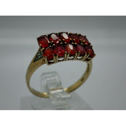 77 - 9ct gold ring set with rubies, size R, 2.7g. UK P&P Group 0 (£6+VAT for the first lot and £1+VAT for... 