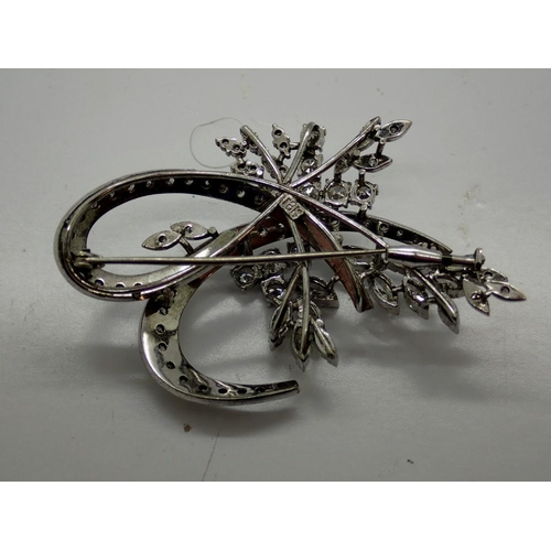 83 - Large and impressive 18ct white gold floral design brooch set with diamonds, L: 60 mm, 12.9g, boxed.... 