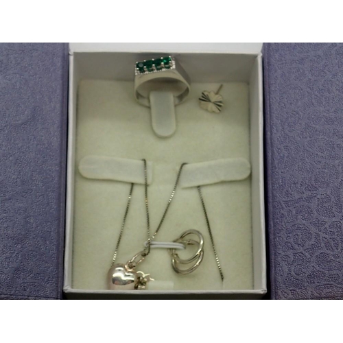 129 - 925 silver pendant necklace, ring and two pairs of earrings, boxed. UK P&P Group 1 (£16+VAT for the ... 