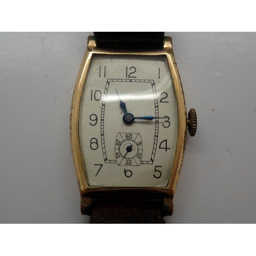 152 - Gents Swiss made 15 jewel wristwatch in a gold filled case with subsidiary seconds dial on a brown l... 