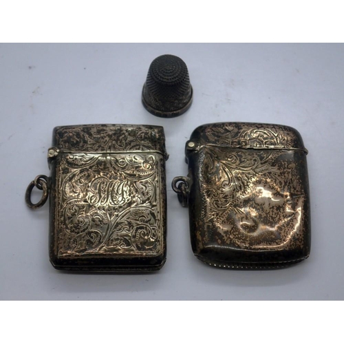 173 - Two hallmarked silver vesta cases, Birmingham assay, and a hallmarked silver thimble, combined 45g. ... 