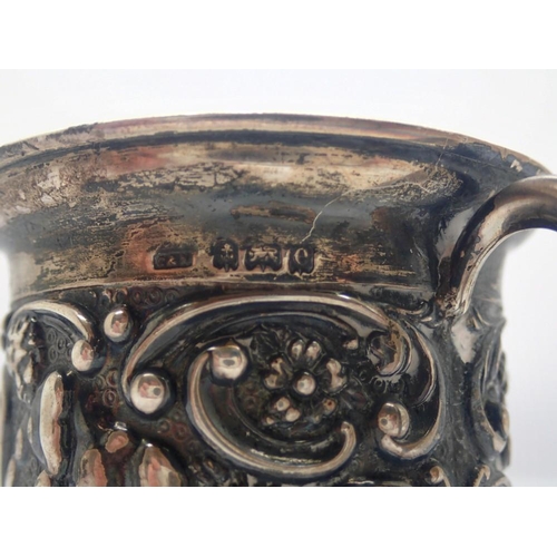 174 - Victorian hallmarked silver christening tankard, relief decorated with figures and swags, H: 56 mm, ... 