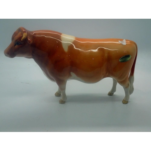 254 - Beswick Guernsey bull, no cracks or chips, L: 19 cm. UK P&P Group 2 (£20+VAT for the first lot and £... 