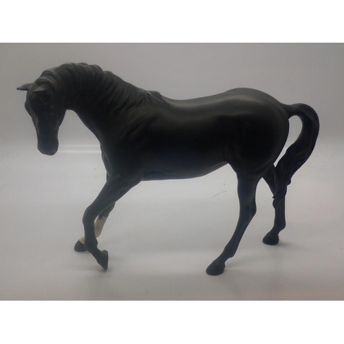 265 - Beswick matte glazed horse, small scrape to one hoof, L: 25 cm. UK P&P Group 3 (£30+VAT for the firs... 