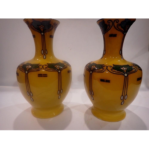 276 - Two Elers Ware vases colourised, one with repaired cracks, H: 28 cm. Not available for in-house P&P