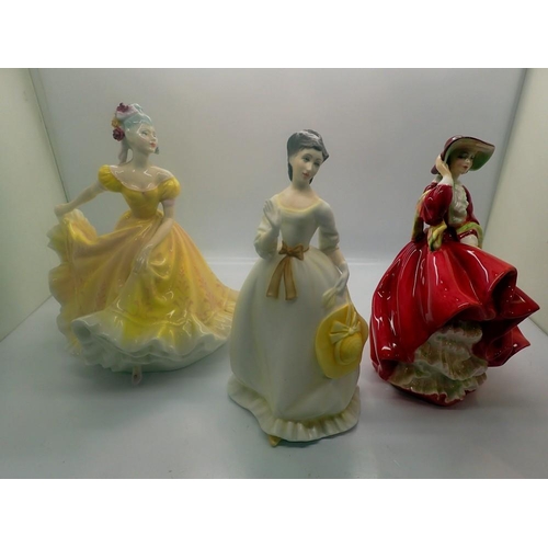 287 - Two Royal Doulton figurines, Nanette and Top O the Hill, and a Royal Worcester figurine, Summertime,... 