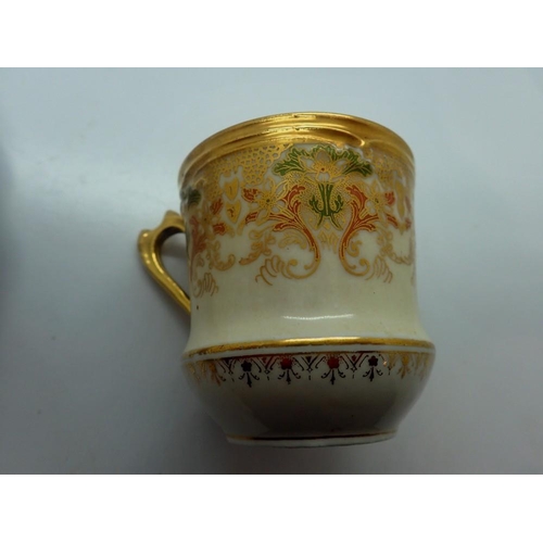 305 - Limoges gilt cup and saucer, small hairline crack to saucer and losses to gilt, D: 13 cm. UK P&P Gro... 