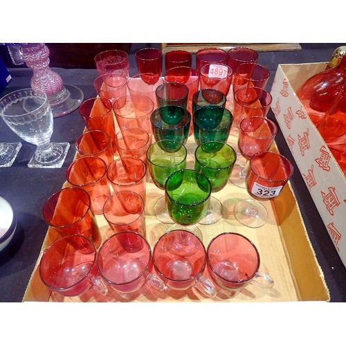 323 - Large collection of cranberry and green coloured glass goblets and beakers. Not available for in-hou... 