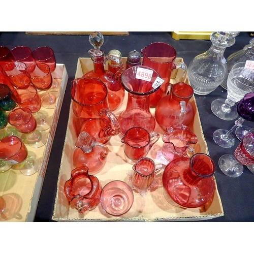 324 - Mixed Victorian cranberry glass including jugs and castors. Not available for in-house P&P