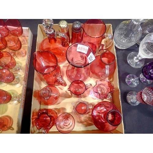 324 - Mixed Victorian cranberry glass including jugs and castors. Not available for in-house P&P