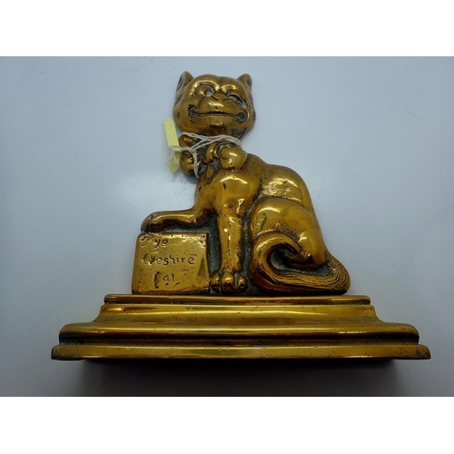 337 - Brass Cheshire cat doorstop, H: 26 cm. UK P&P Group 2 (£20+VAT for the first lot and £4+VAT for subs... 