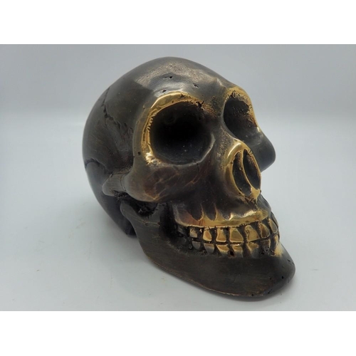 340 - Contemporary bronze skull, L: 90 mm. UK P&P Group 1 (£16+VAT for the first lot and £2+VAT for subseq... 