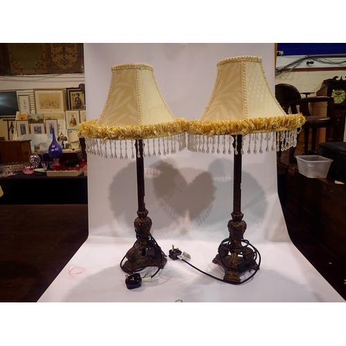 363 - Pair of bronzed resin based table lamps with shades, H: 72 cm. All electrical items in this lot have... 