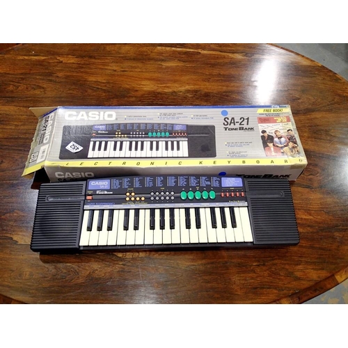 452 - Casio SA-21 Electronic keyboard, boxed. Not available for in-house P&P