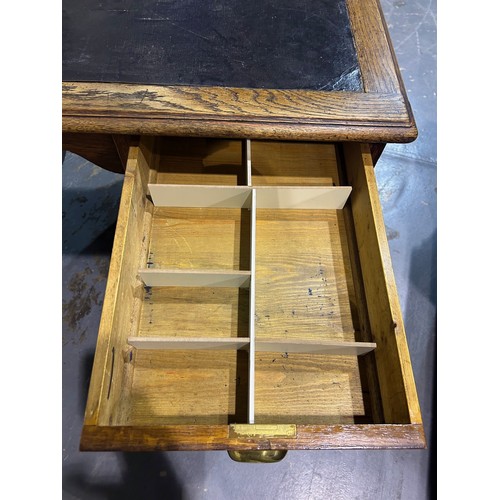 2071 - A Victorian oak twin pedestal partners desk, each side fitted with cupboards, one side with two draw... 