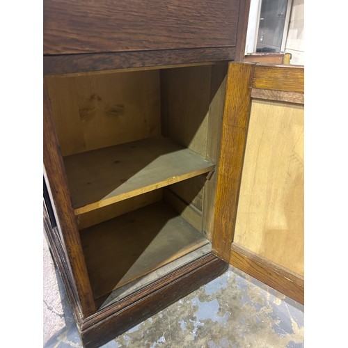 2071 - A Victorian oak twin pedestal partners desk, each side fitted with cupboards, one side with two draw... 