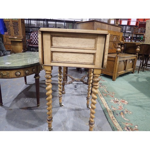 2080 - A Victorian Birdseye maple pot cupboard, with fall front and two drop-leaves, raised on twist suppor... 