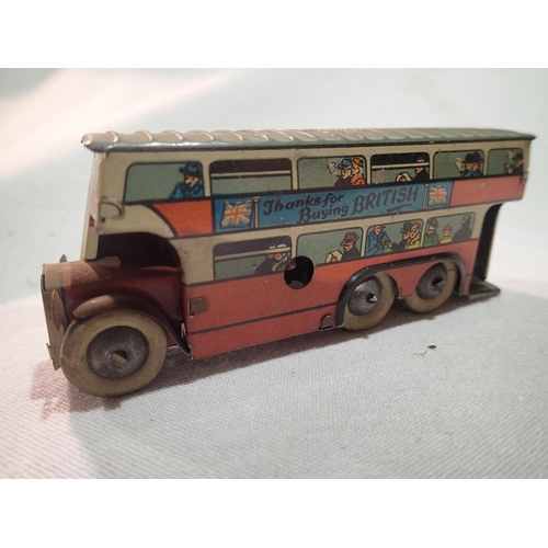 2110 - Gama clockwork sparking tank and a Wells clockwork bus, both good condition, untested, plus diecast ... 