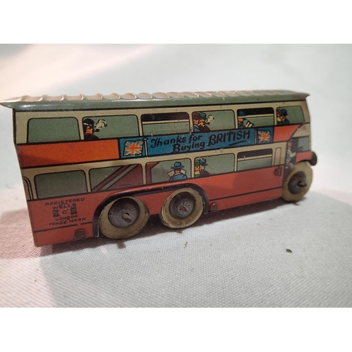 2110 - Gama clockwork sparking tank and a Wells clockwork bus, both good condition, untested, plus diecast ... 