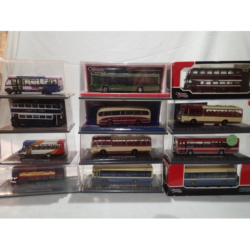 2208 - Twelve Corgi OOC buses and coaches, mostly Ribble or North England, excellent condition, storage wea... 