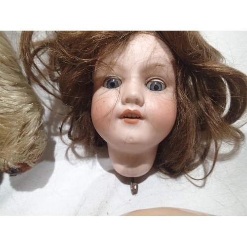 2216 - Vintage A.M doll approximately 40 cm tall, sleep eyes and open mouth showing teeth, dismembered, plu... 