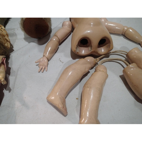 2216 - Vintage A.M doll approximately 40 cm tall, sleep eyes and open mouth showing teeth, dismembered, plu... 