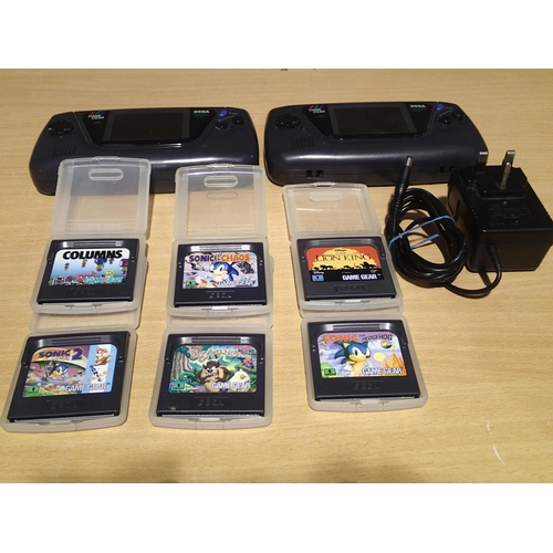 2221 - 5050, Two Sega Game Gear consoles, one rattling, one powers on but no screen. Includes PSU and 7 gam... 