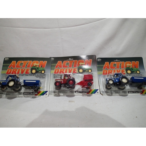 2236 - Britains Action Drive 3 corded diecast models by Britains, appearing in excellent condition on VG ca... 