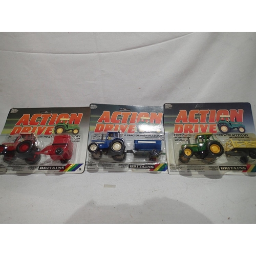 2237 - Britains Action Drive 3 corded diecast models by Britains, appearing in excellent condition on VG ca... 