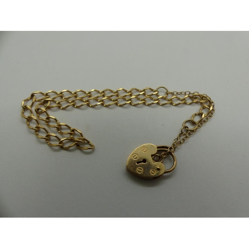 60 - 9ct gold bracelet with padlock clasp and safety chain, L: 24 cm, 2.9g. UK P&P Group 0 (£6+VAT for th... 