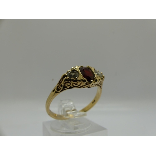 66 - 9ct gold trilogy ring set with garnet and cubic zirconia, size Q, 3.0g. UK P&P Group 0 (£6+VAT for t... 