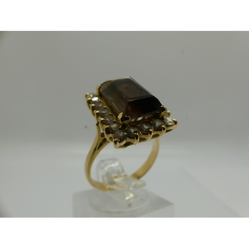 68 - 14ct gold ring set with large panel of smokey quartz surrounded by topaz, size O, 4.5g. UK P&P Group... 