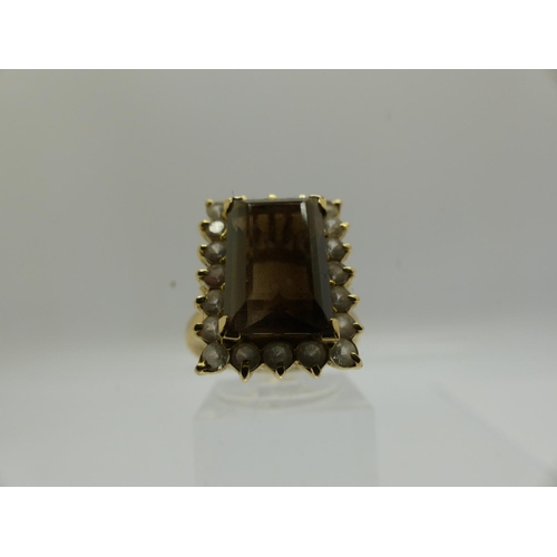 68 - 14ct gold ring set with large panel of smokey quartz surrounded by topaz, size O, 4.5g. UK P&P Group... 