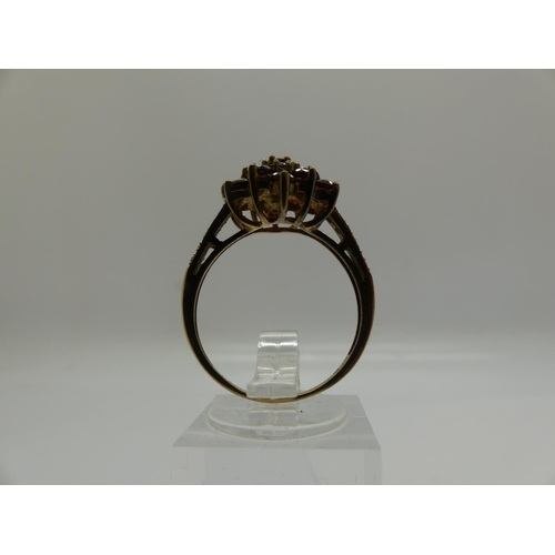 69 - 9ct gold cluster ring set with garnets and diamond set shoulders, size P, 2.8g. UK P&P Group 0 (£6+V... 