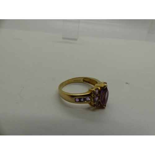 89 - 9ct gold cluster ring set with amethysts, size N/O, 3.2g. UK P&P Group 0 (£6+VAT for the first lot a... 