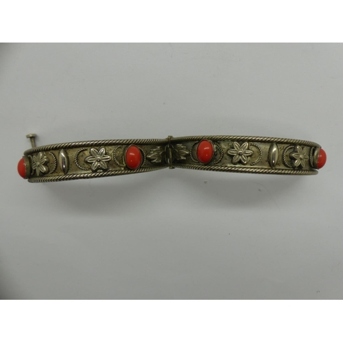 91 - White metal bangle with coral cabochons, D: 70 mm. UK P&P Group 0 (£6+VAT for the first lot and £1+V... 