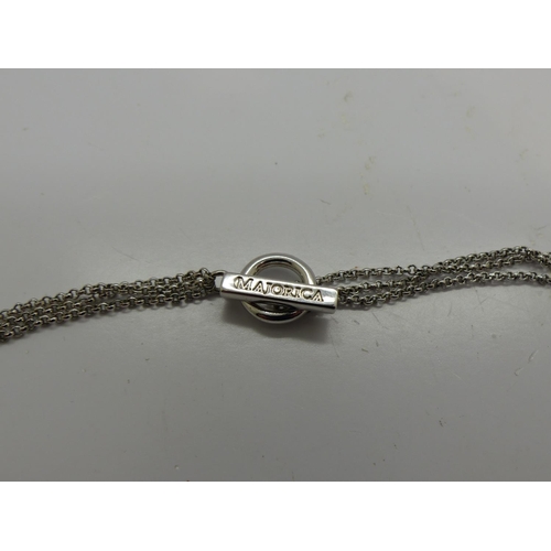 121 - 925 silver triple strand pendant necklace, set with opal and T-bar clasp, necklace L: 40cm. UK P&P G... 