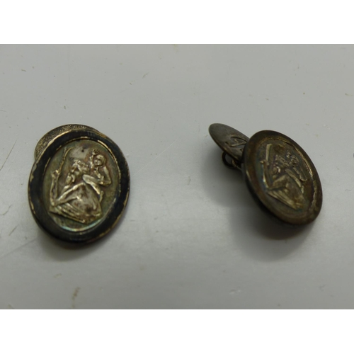 133 - Pair of silver cufflinks, each depicting St Christopher. UK P&P Group 0 (£6+VAT for the first lot an... 