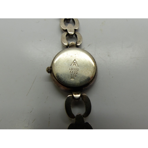 138 - ACCURIST: 925 silver cased ladies wristwatch on a 925 silver bracelet, working at lotting. UK P&P Gr... 