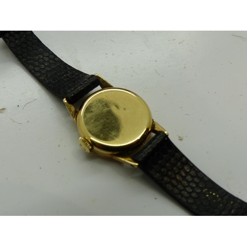 152 - Omega 9ct gold cased ladies wristwatch, on a black leather strap, boxed. Not working. UK P&P Group 1... 